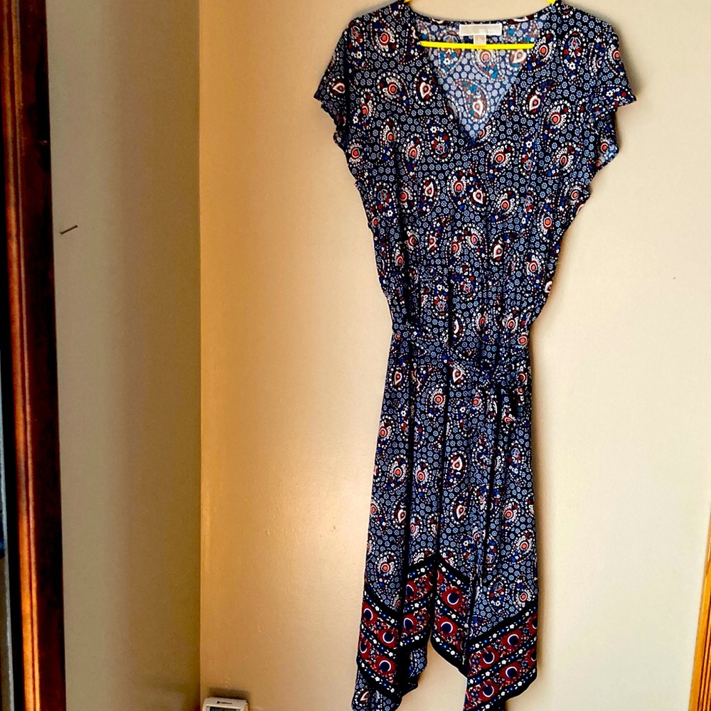 Asymmetrical dress , soft and unique , beautiful cut and flowing look.